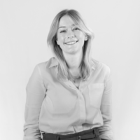 grey filtered headshot of Emma Coleman