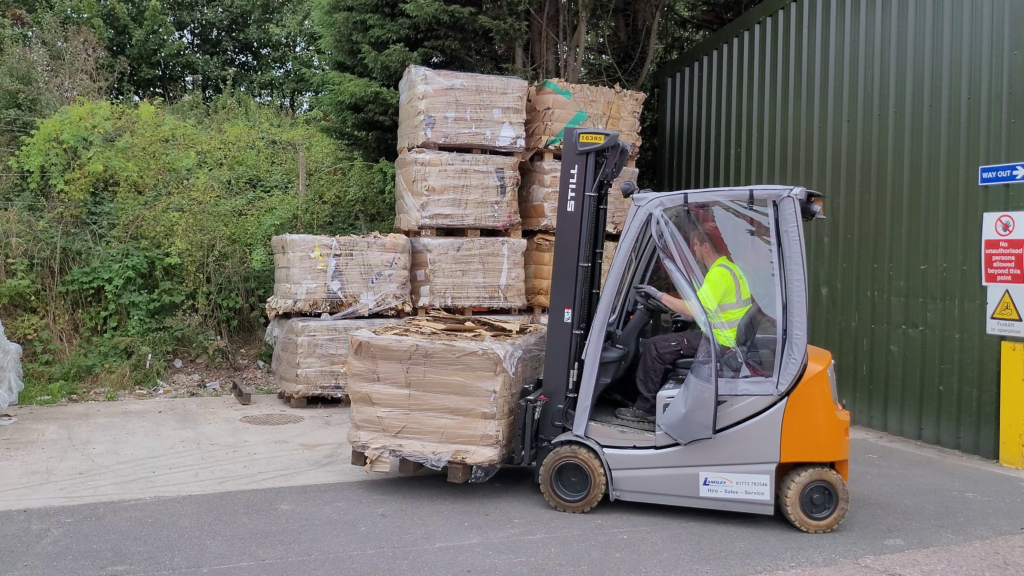 Marchington Recycling Area (4) employee operating forklift within the Marchington site's Recycling Area